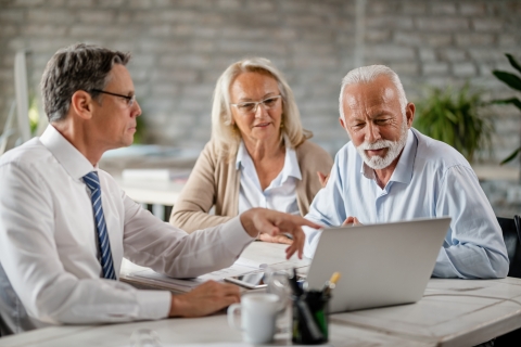 an insurance agent takes meeting notes